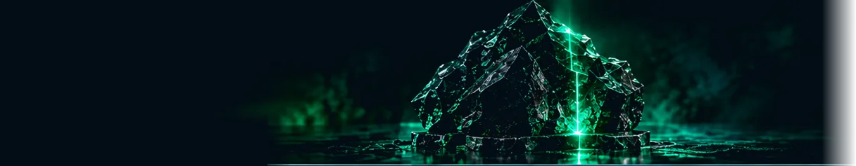 Uma rocha verde iluminada por dentro, sobre a ardósia